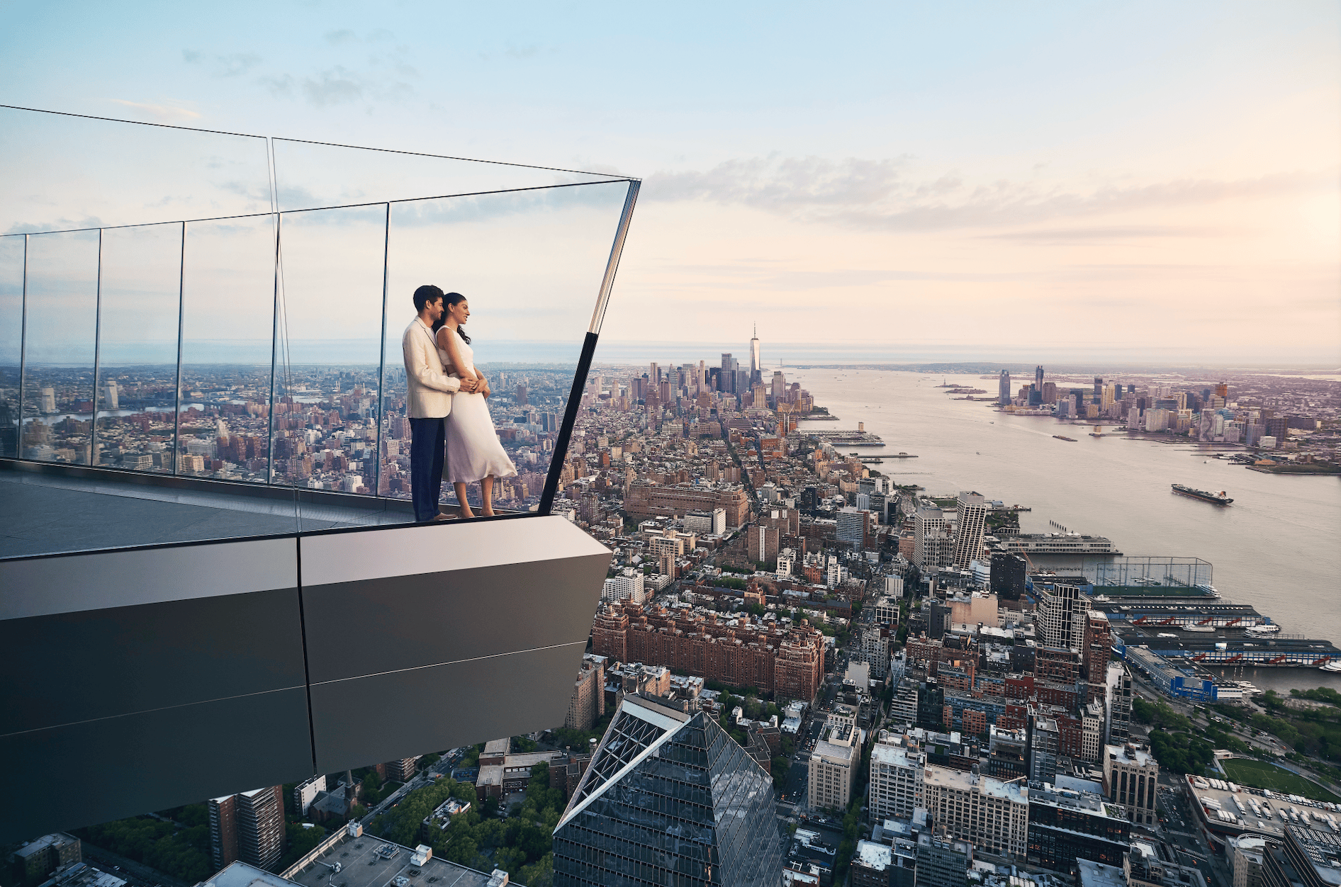 Couple at western overhang of Edge NYC outdoor skydeck